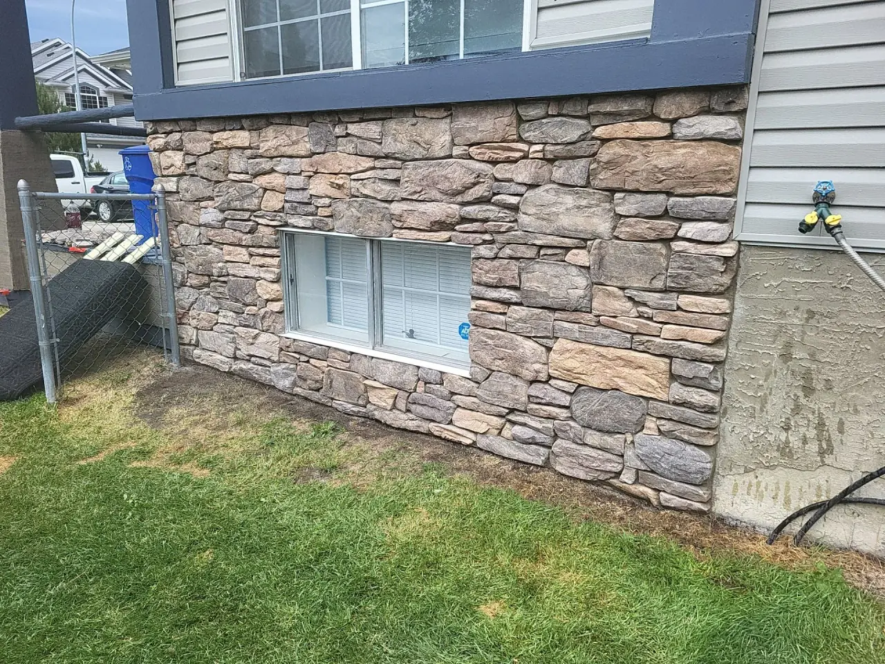 Foundation stone veneer replaced with a seamless match
