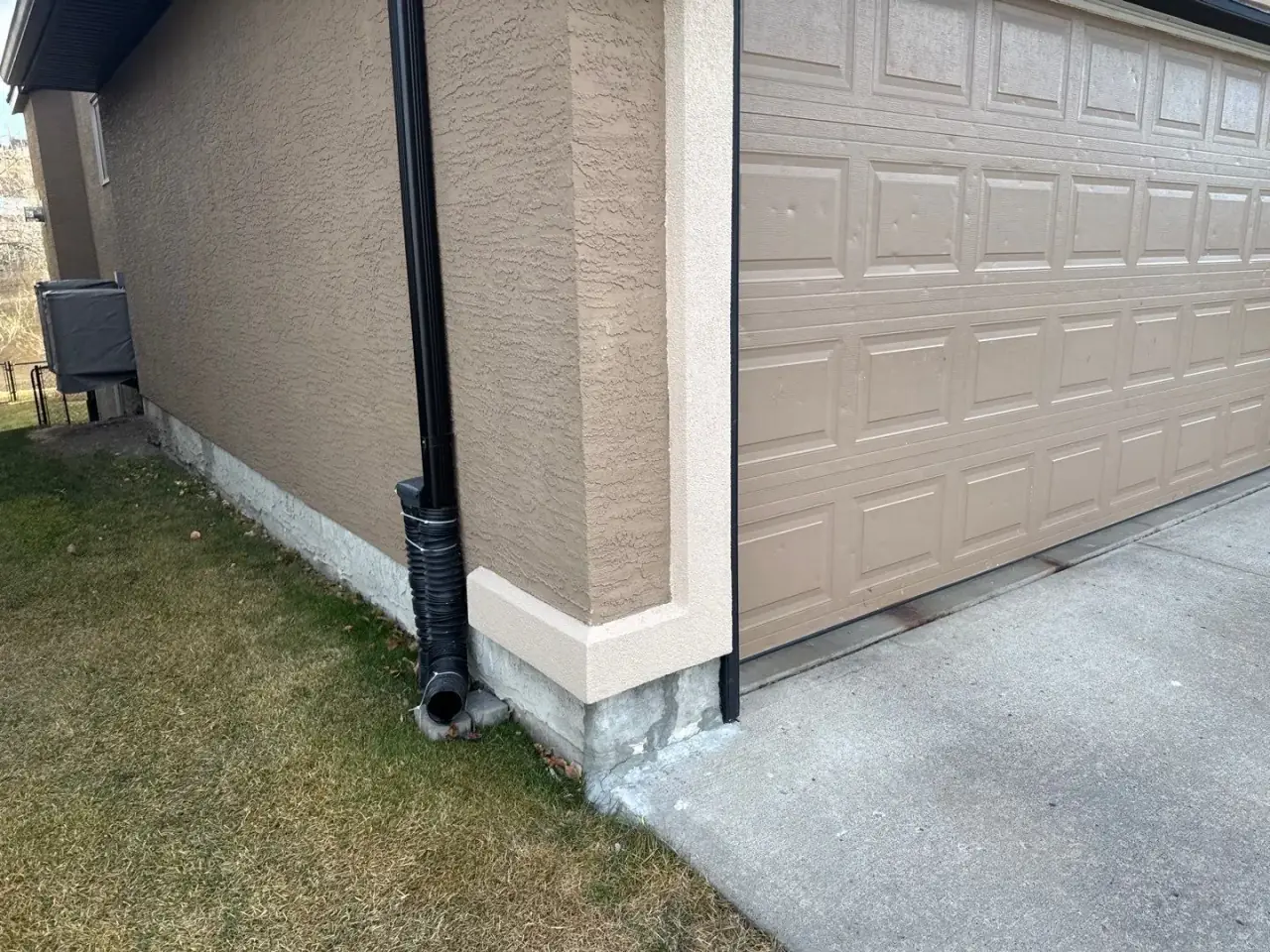 Same Calgary home after professional stucco painting