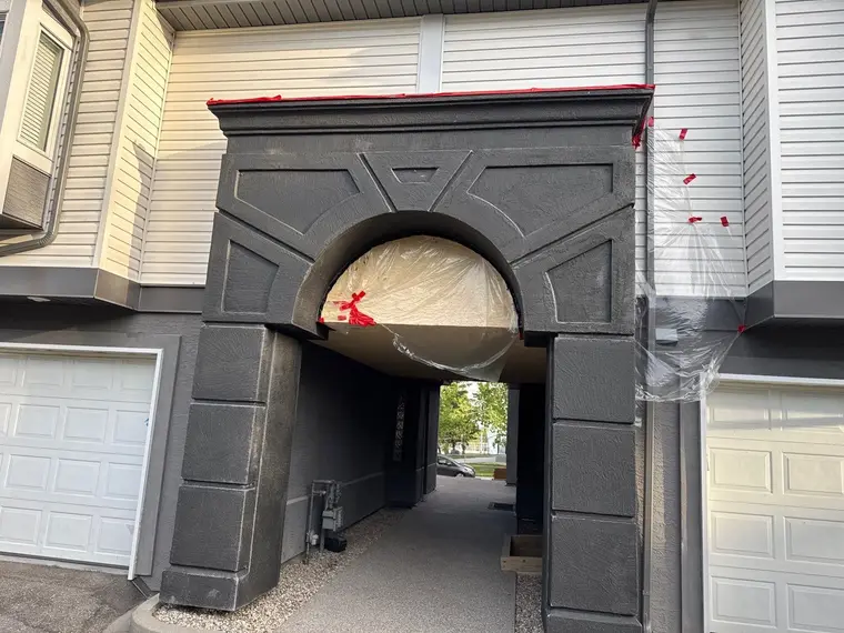 Two-coat woodpecker protection system applied over the rebuilt portico