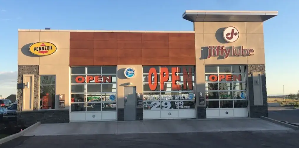 Jiffy Lube oil change location with new commercial stucco by Calgary Parging