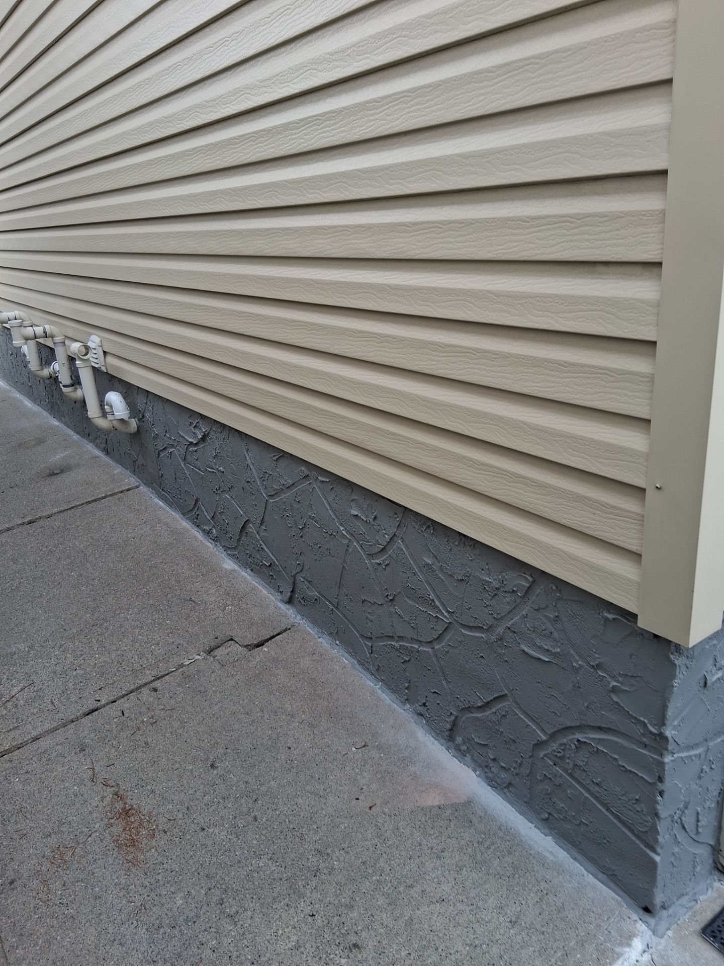 New parging and paint on the same foundation