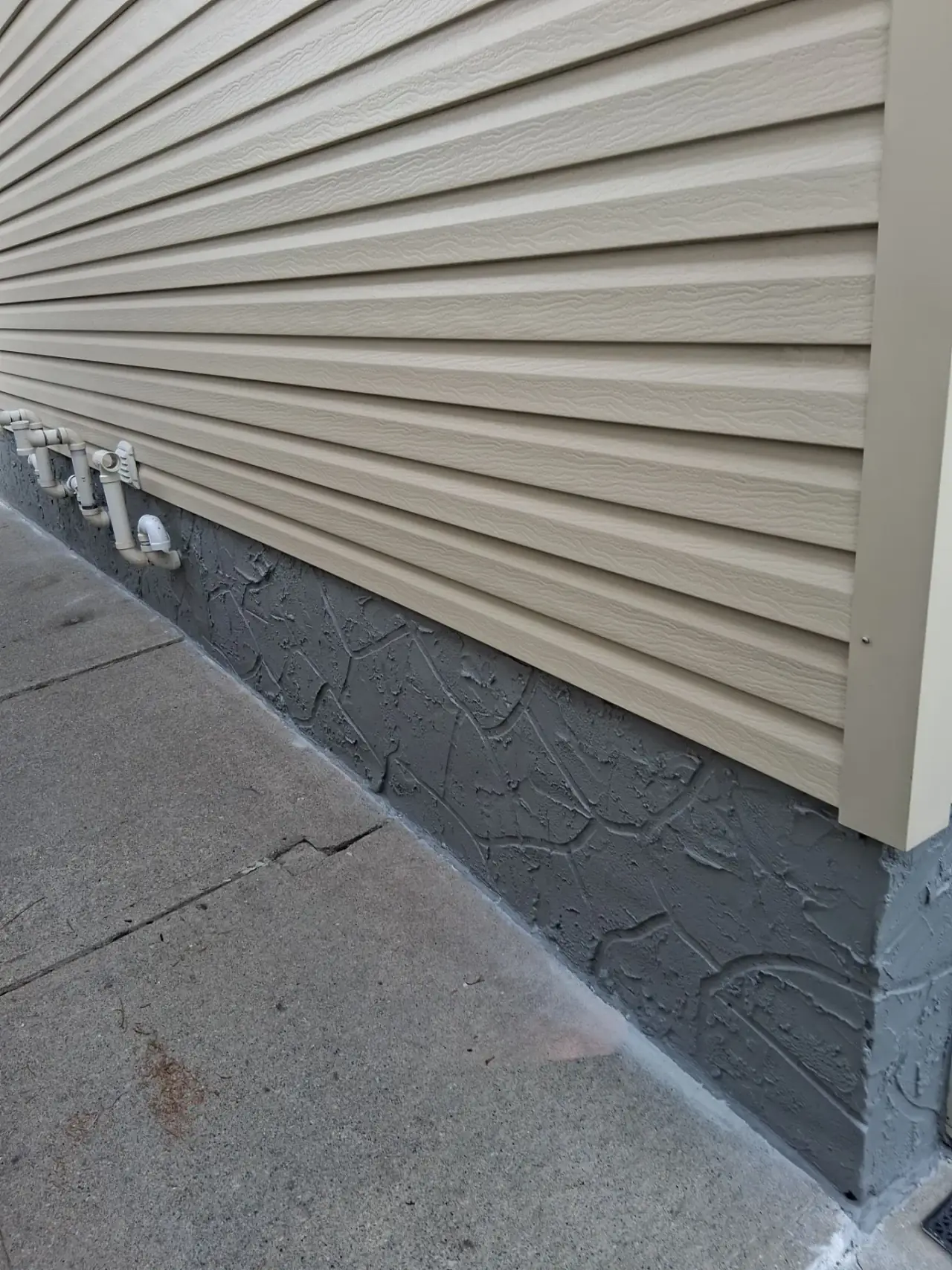 New parging and paint on the same foundation