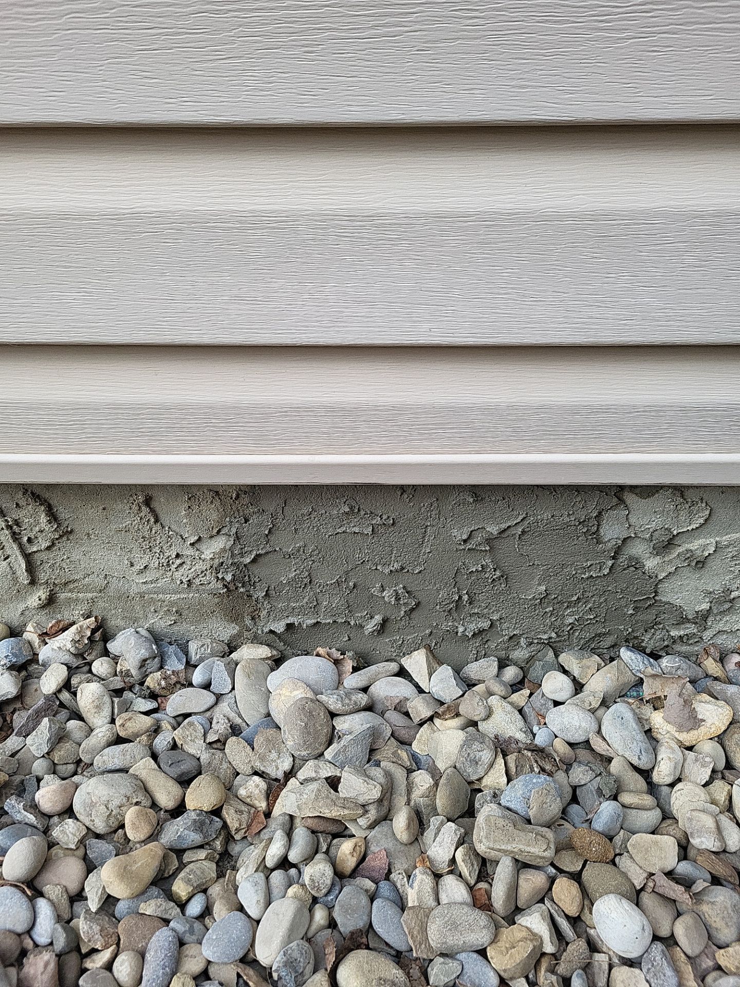Same wall after crack repair and re-parging